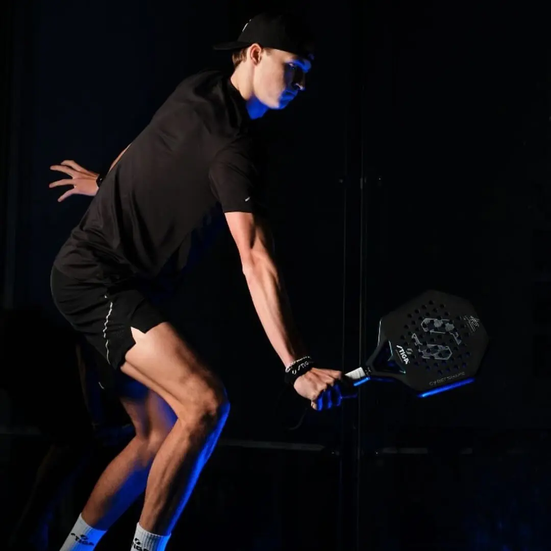 Stiga athlete with racket